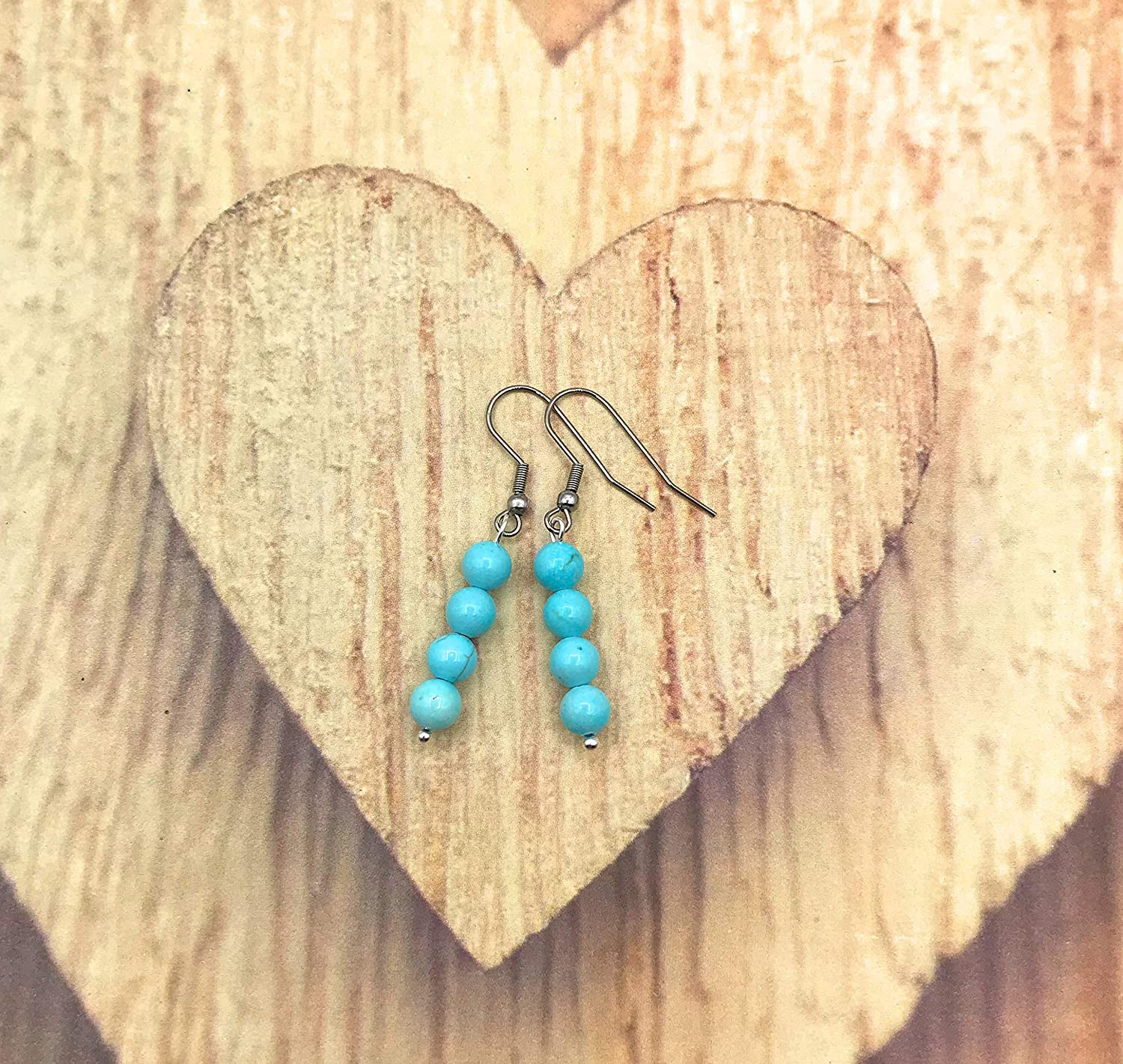 Blue Magnesite Gemstone Dangle Beaded Earrings on Wood Display from Scott D Jewelry Designs