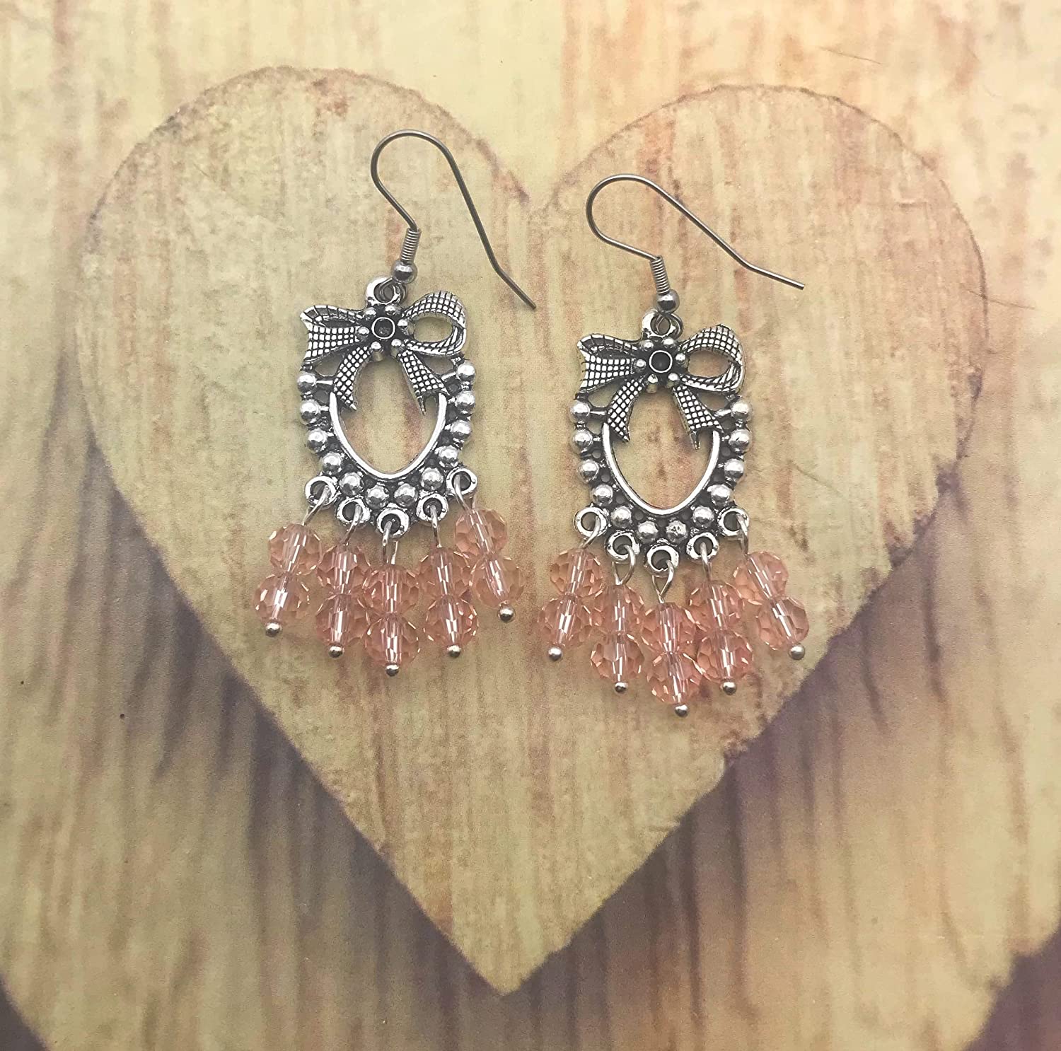 Pink Beaded Chandelier Earrings on a Wooden Display from Scott D Jewelry Designs