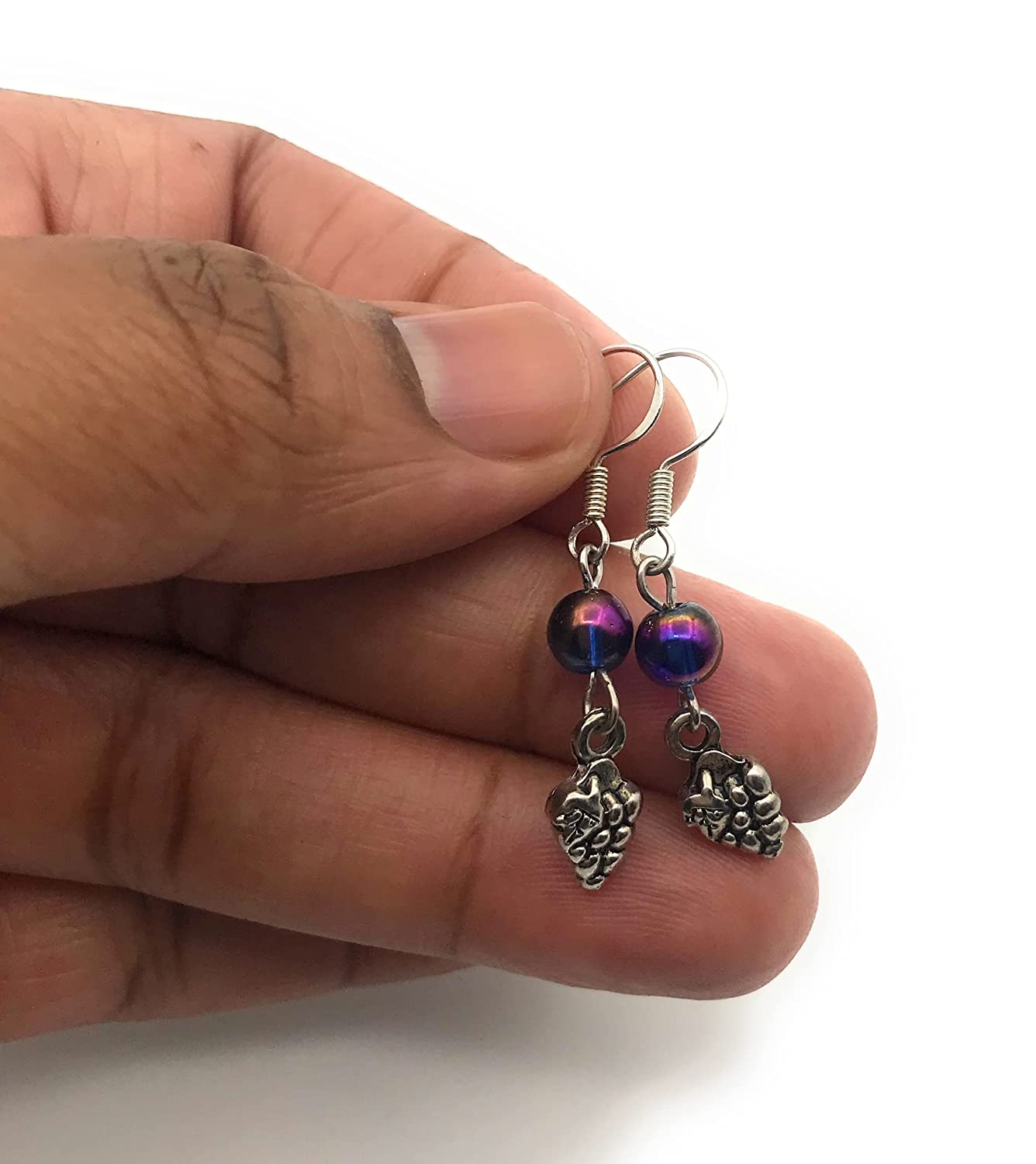 Bunch of Grapes Charm Purple Beaded Earrings Held by Fingertips from Scott D Jewelry