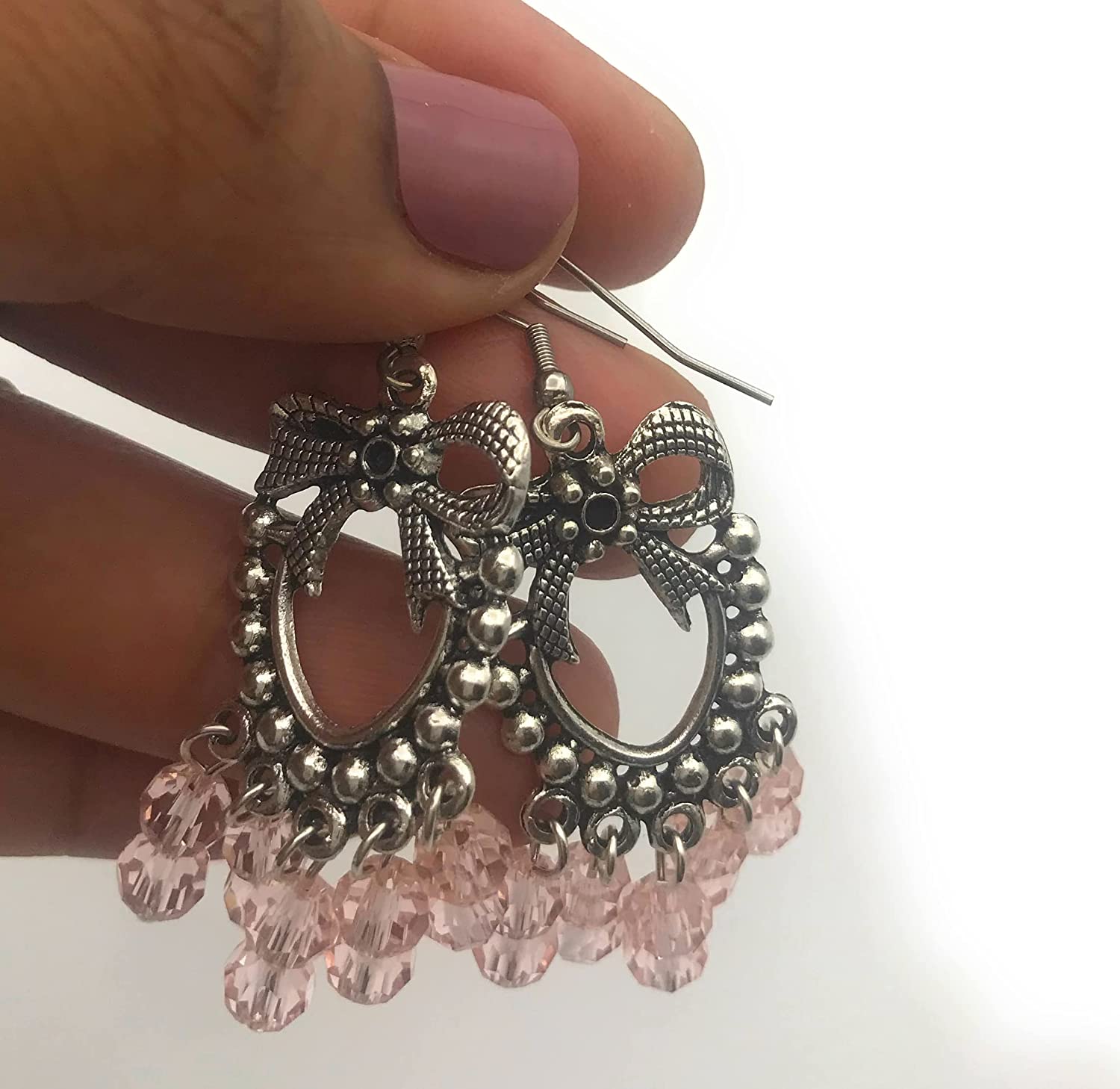 Pink Beaded Chandelier Earrings Shown Dangling from Hand at Scott D Jewelry Designs