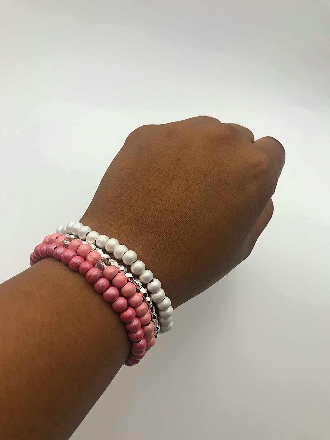 Pink and Silver Set of 4 Wooden Beaded Stretch Bracelets on Wrist from Scott D Jewelry Designs