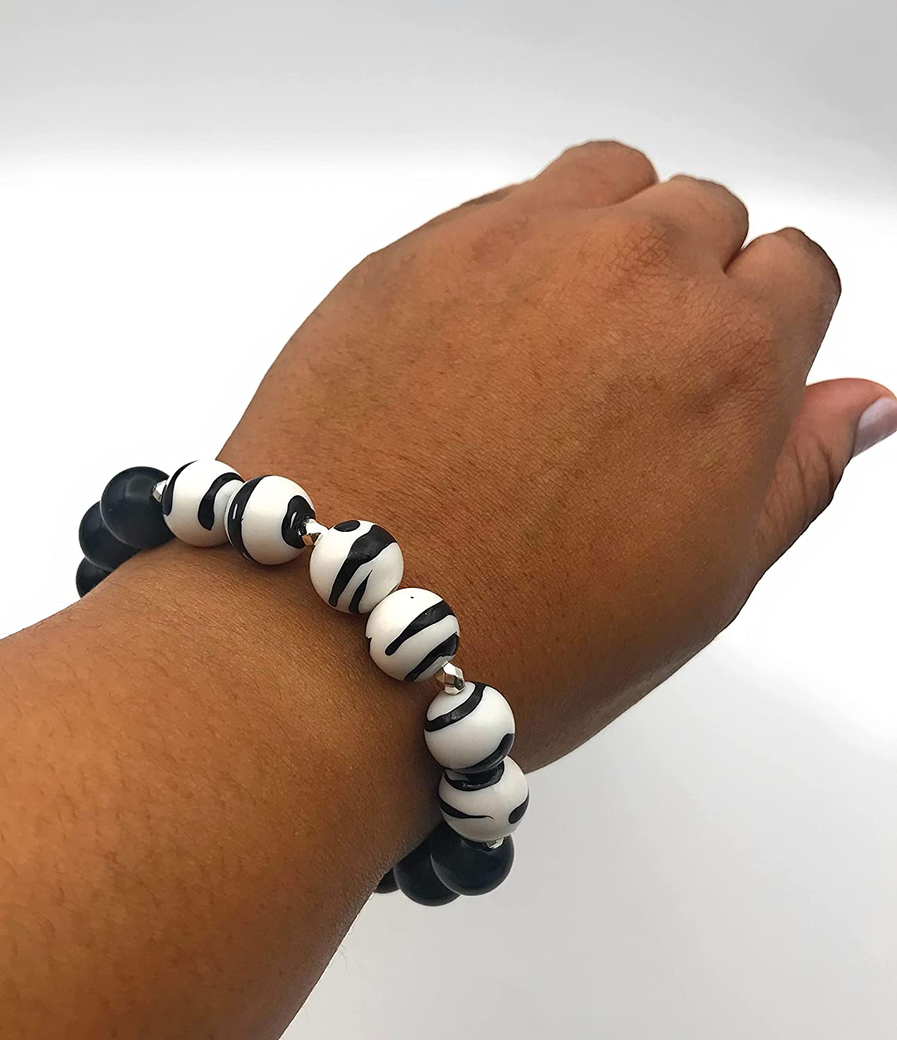 Black and White Elastic Bracelet on a Womans Wrist from Scott D Jewelry Designs