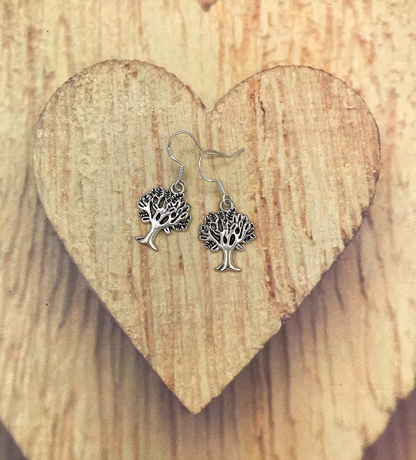Tree of Life Earrings on a Wooden Heart Display from Scott D Jewelry Designs