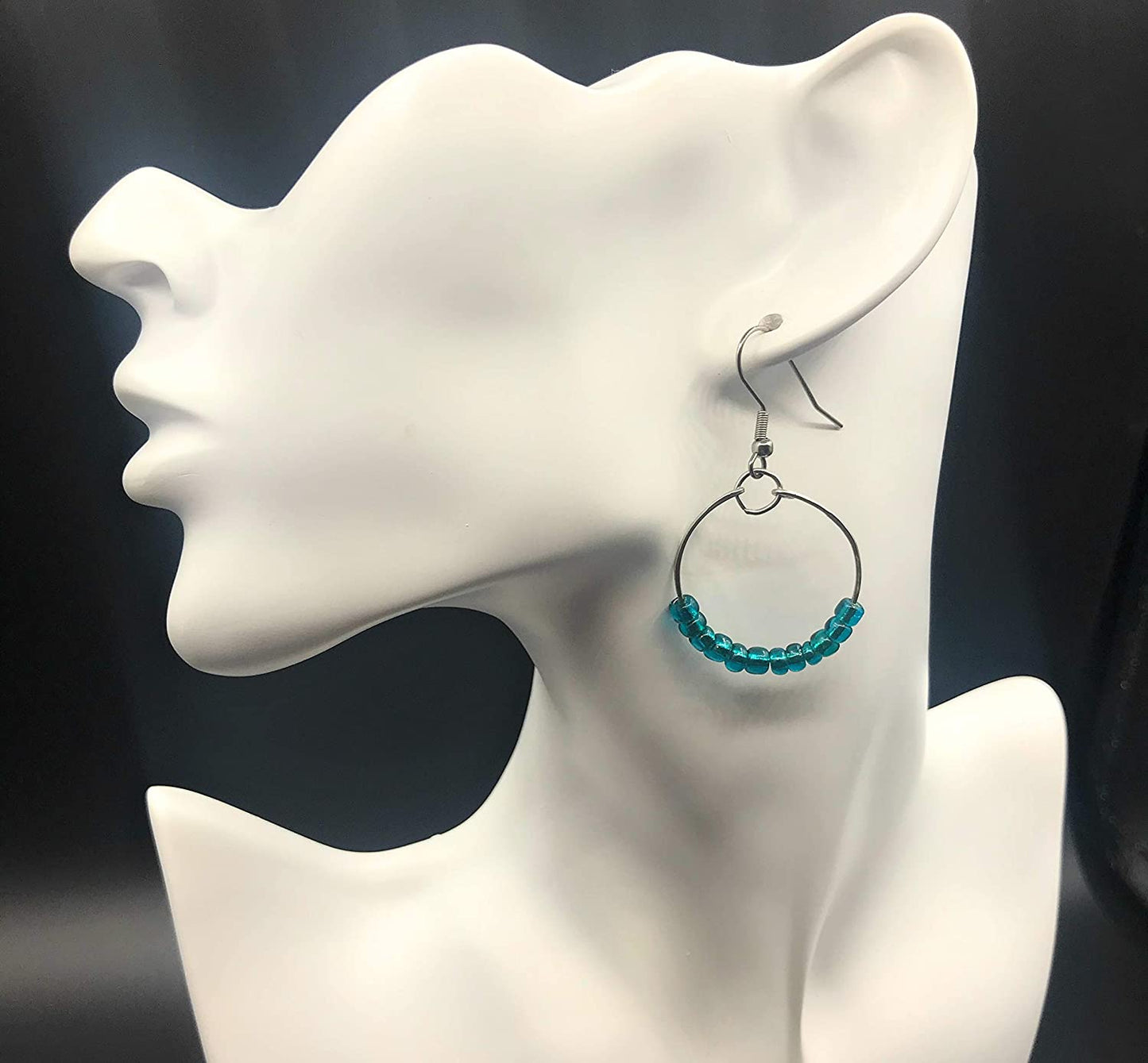 Teal Blue Beaded Hoop Earrings Displayed on Mannequin from Scott D Jewelry Designs